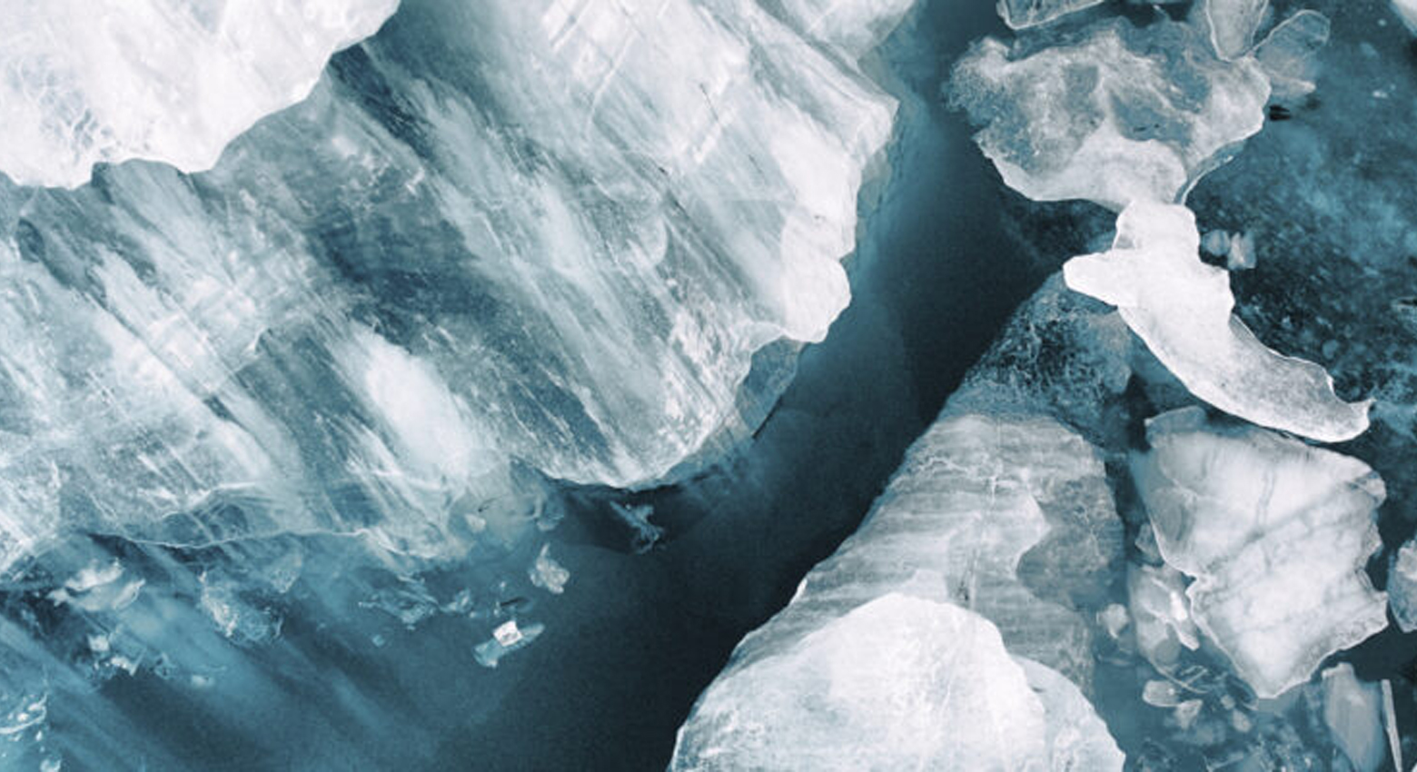 Small icebergs broken off from the large glacier at Vatnajökull, Iceland. Image was taken with a drone.